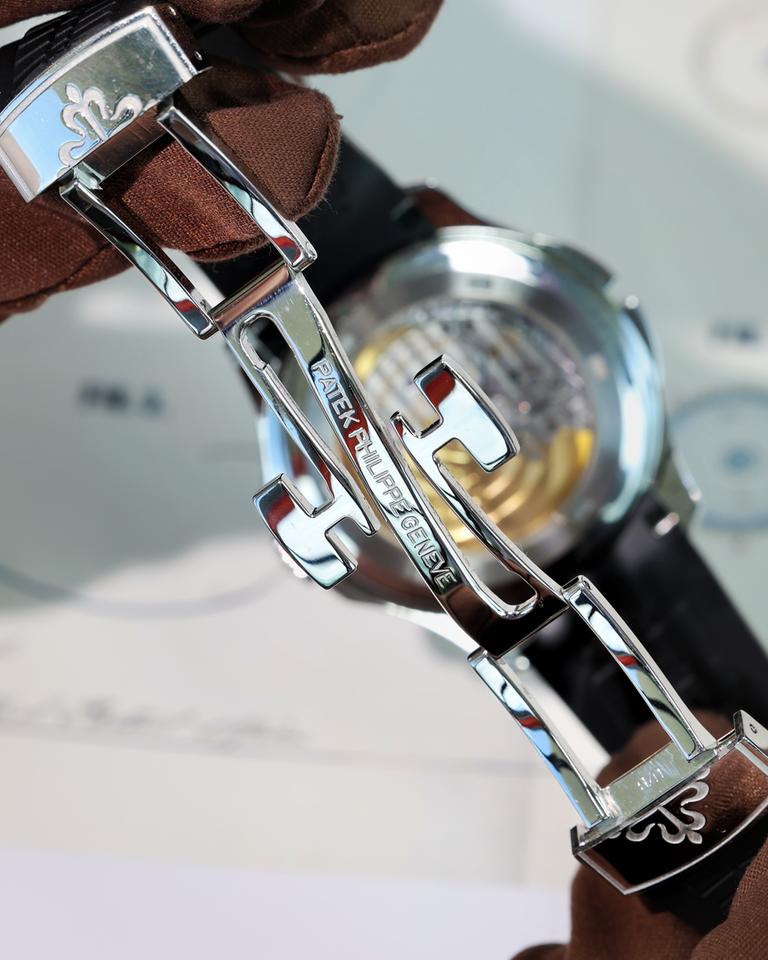 Patek Philippe Aquanaut Travel Time 5164A-001 40.8mm Stainless Steel Black Dial Automatic Watch