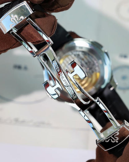 Patek Philippe Aquanaut Travel Time 5164A-001 40.8mm Stainless Steel Black Dial Automatic Watch