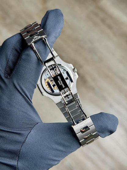 Patek Philippe Nautilus 5810/1G-001 41mm White Gold Blue Sunburst Dial Automatic Watch